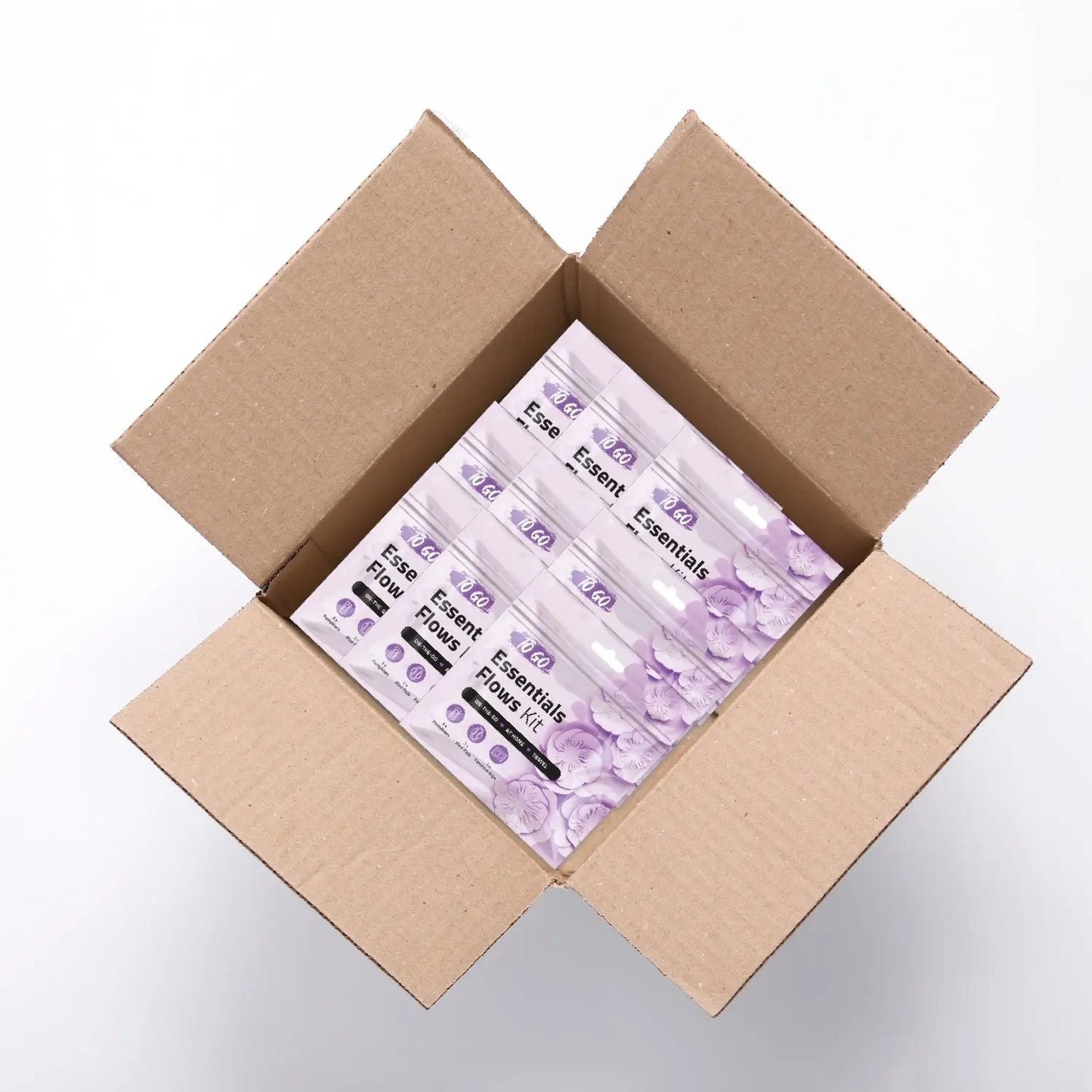 Case of 50 Purple Essential Flows Kits featuring feminine hygiene essentials for on-the-go, at home, or travel use.
