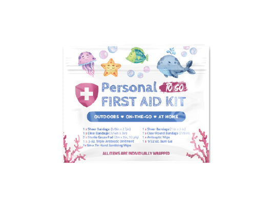 Sea Life Mini First Aid Kit with ocean-themed design featuring whales, jellyfish, and starfish on the packaging, labeled for outdoor, on-the-go, and at-home use.
