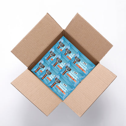 Case of 50 Blue Shaving Kits packaging with razor graphic and travel-friendly design