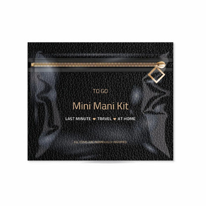 Front view of Black Mini Manicure Kit To Go featuring matte black packaging with gold accent design — includes nail care essentials for travel or at-home grooming.
